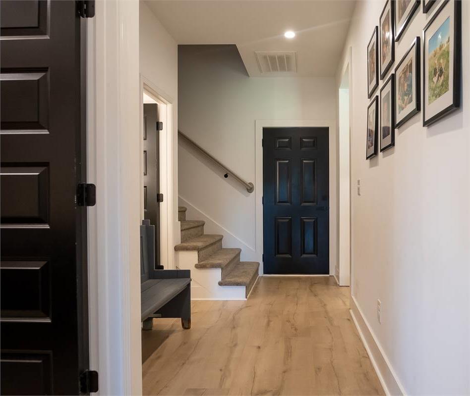Hallway and Stairs Leading to Bonus Room image of Chelci House Plan