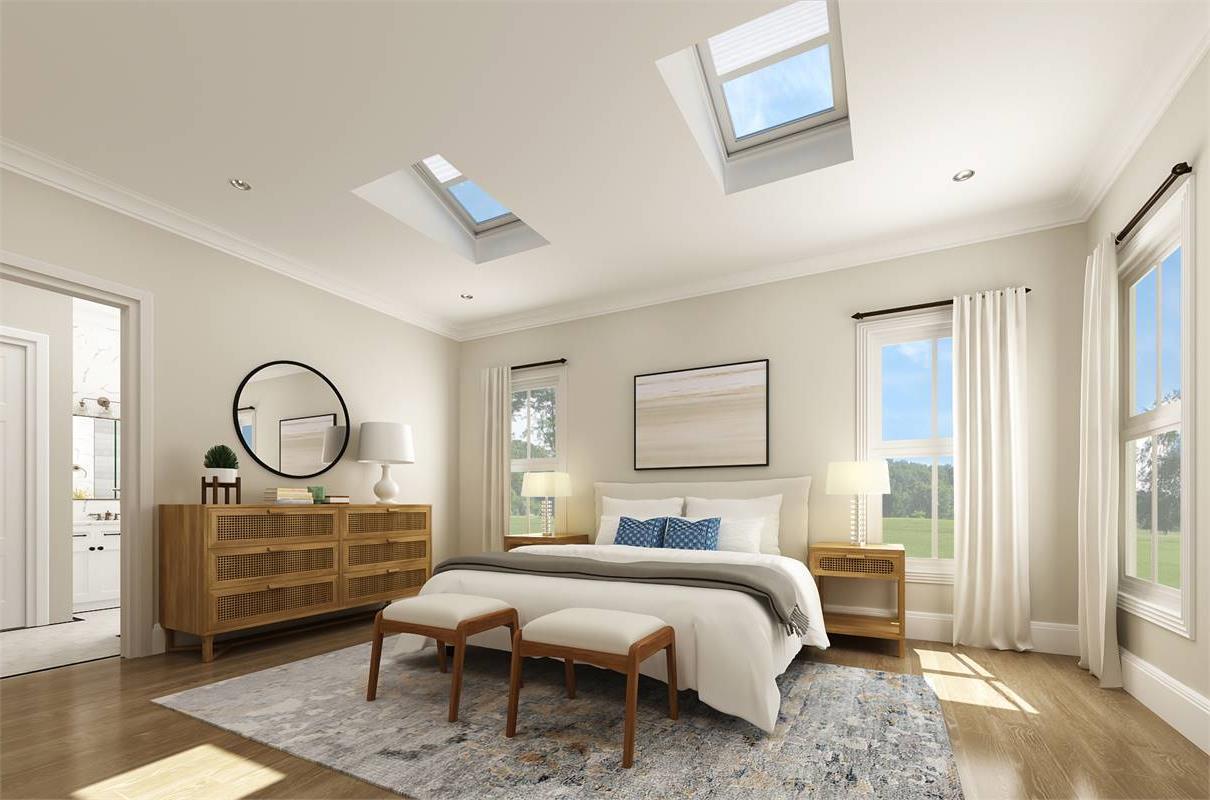 Beautiful Master Bedroom with Large Windows and Skylights image of Cloverwood House Plan